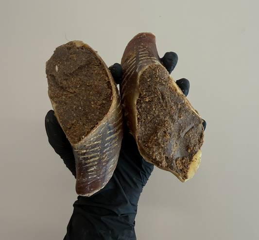2 filled cow hooves dog treat